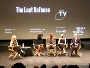 The cast of The Last Defense being interviewed on stage